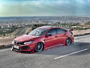 Honda Civic uyumlu Fc5 Custom Ön Lip modelleri DRS Tuning'de. Kaliteli malzeme, hızlı kargo ve güvenli alışverişle hemen inceleyin.