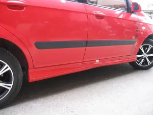 Fiat Marea 1996-2007 (Type 185) uyumlu Yan Marşpiyel Boyalı modelleri DRS Tuning'de. Kaliteli malzeme, hızlı kargo ve güvenli alışverişle hemen inceleyin.