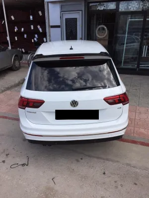 Volkswagen Tiguan 2024-Günümüz uyumlu 2015 Sonrası Ant Spoiler Fiberglas modelleri DRS Tuning'de. Kaliteli malzeme, hızlı kargo ve güvenli alışverişle hemen